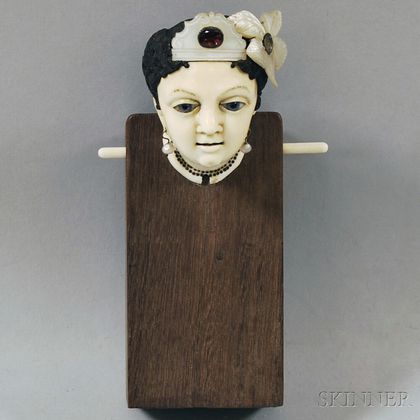 Glass-eyed Ivory Lady's Head on Wooden Stand