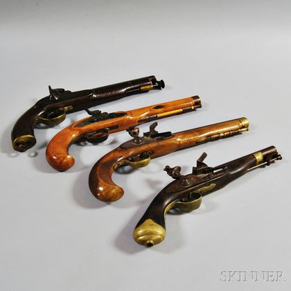 Four Reproduction Pistols. Estimate $150-250
