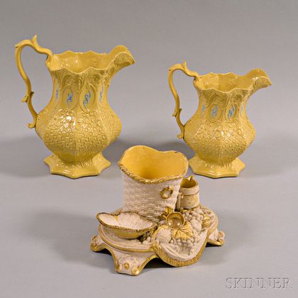 Two Yellowware Pitchers and a Tobacco Holder
