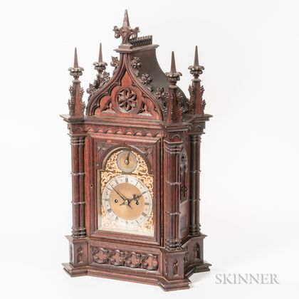 Carved Rosewood Gothic-style Quarter-chiming Mantel Clock