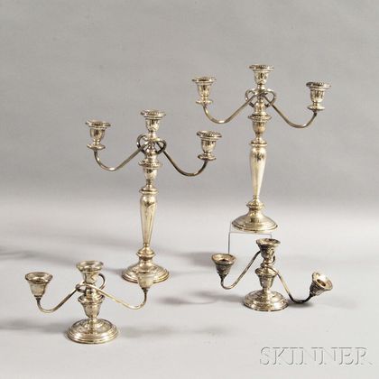 Two Pairs of Sterling Silver Weighted Three-arm Candlesticks
