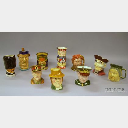 Nine Assorted Ceramic Character and Toby Jugs with a Huntley & Palmers Chromolithograph Toby Biscuit Tin