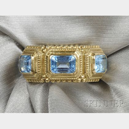 18kt Gold and Blue Topaz Ring