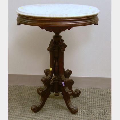 Victorian Oval Marble-top Carved Walnut Stand. 