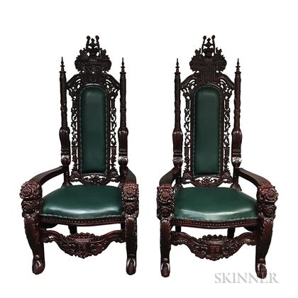 Pair of Cromwellian-style Carved and Stained Hardwood Armchairs