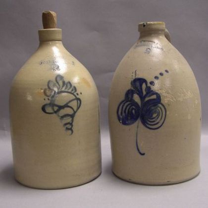F. B. Norton Co. Two-Gallon Cobalt Floral Decorated Stoneware Jug and an Ottman Bros. Two-Gallon Cobalt Floral Decorated Jug. 