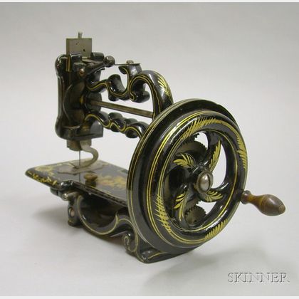 Small Cast Iron Sewing Machine by Louis Beckh