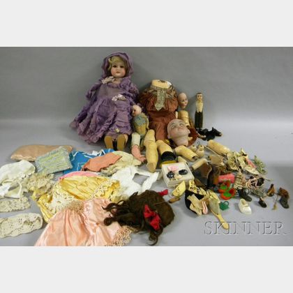 Three Partial German Dolls and Assorted Doll Clothing