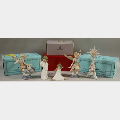 Four Lladro Porcelain Figural Angels and a Star of Bethlehem