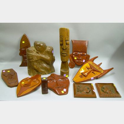 Eleven African, Tiki-style, and Ethnographic Carved Wood Mask Panels, Totems, and a Sculpture. 