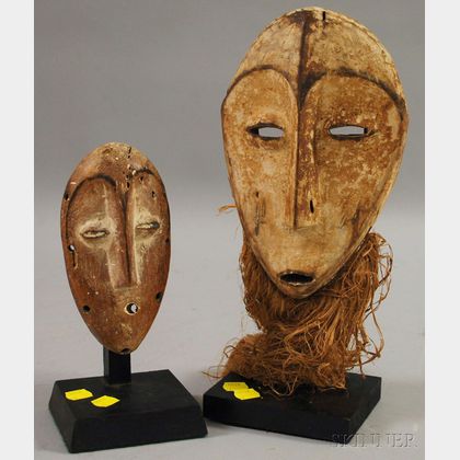 Two Carved Wooden Lega or Lega-style Bwami Masks