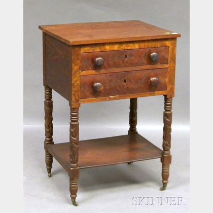Classical Carved Mahogany and Mahogany Veneer Two-drawer Work Table. 