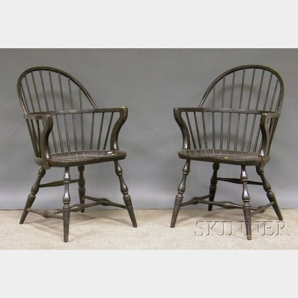 Pair of Owen Sounds Chair Co. Black-painted Windsor-style Sack-back Armchairs. 