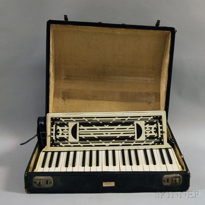 Vintage Cased Rosati Accordion. Estimate $150-250