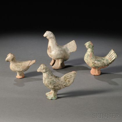 Four Pottery Roosters