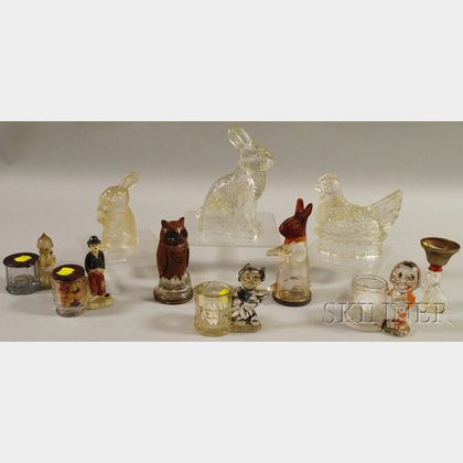 Ten Colorless Glass Figural Candy Containers