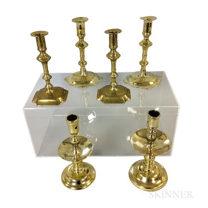 Six Early Brass Candlesticks