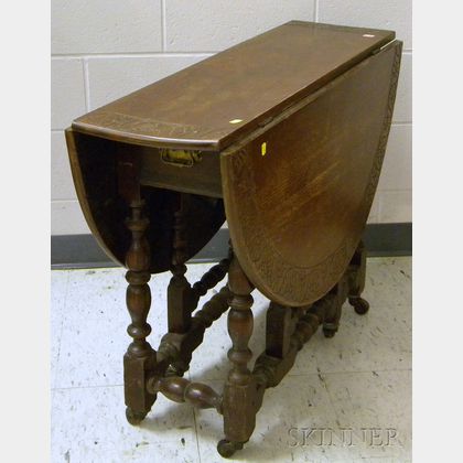 William & Mary Carved Walnut and Maple Drop-leaf Gate-leg Table